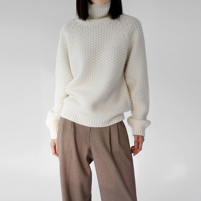 Grid turtleneck knit top